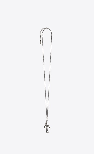 Skeleton charm pendant in metal